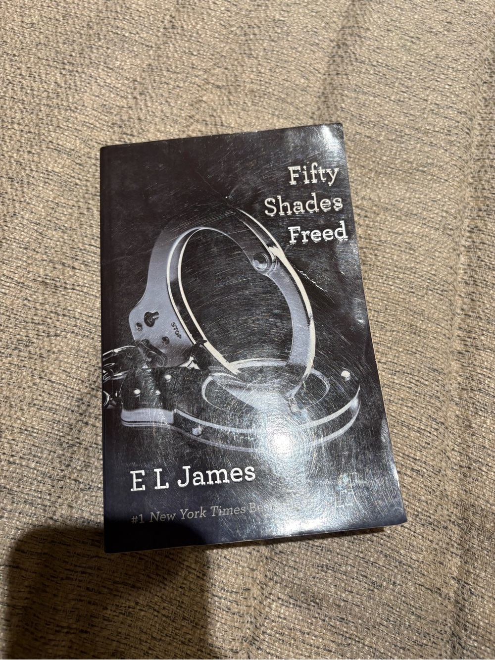 Fifty Shades Freed by E L James — Black & Silver Paperback